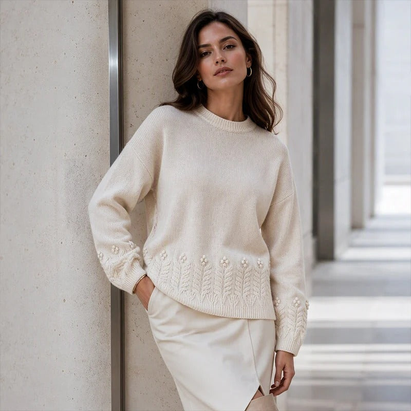 Women's sweater with round neck and cable pattern