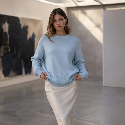 Women's sweater with round neck and cable pattern