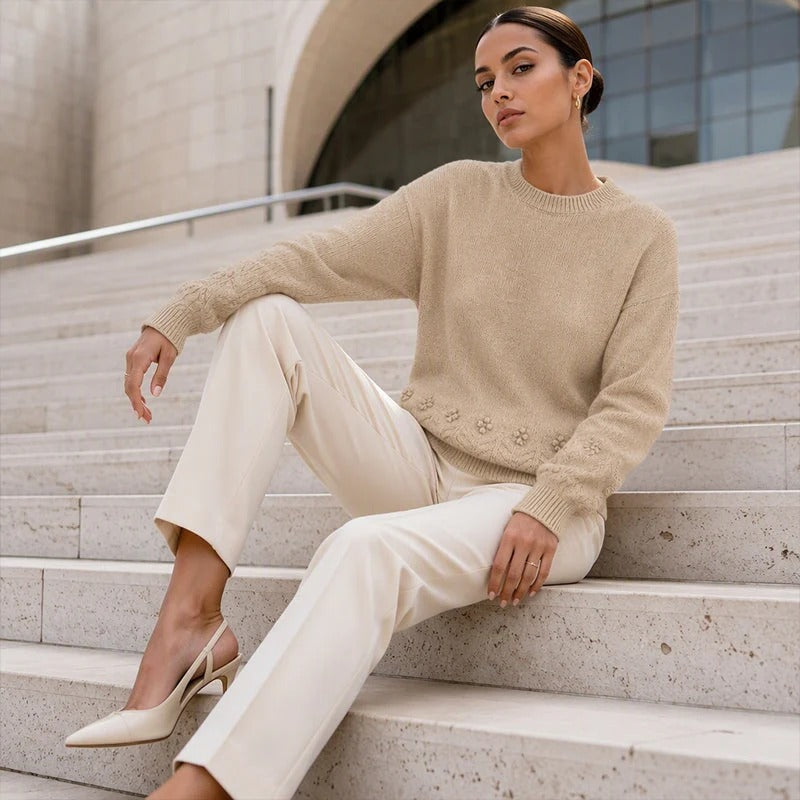 Women's sweater with round neck and cable pattern