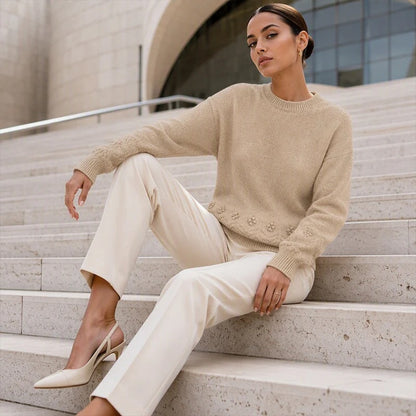 Women's sweater with round neck and cable pattern