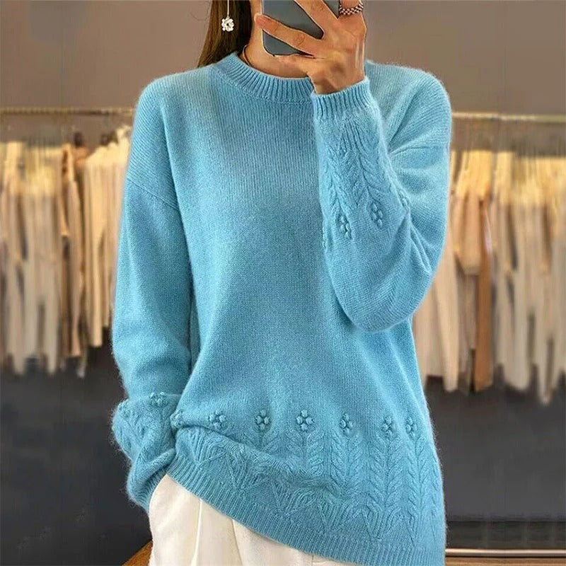 Women's sweater with round neck and cable pattern