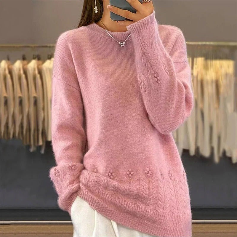 Women's sweater with round neck and cable pattern