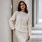 Women's sweater with round neck and cable pattern